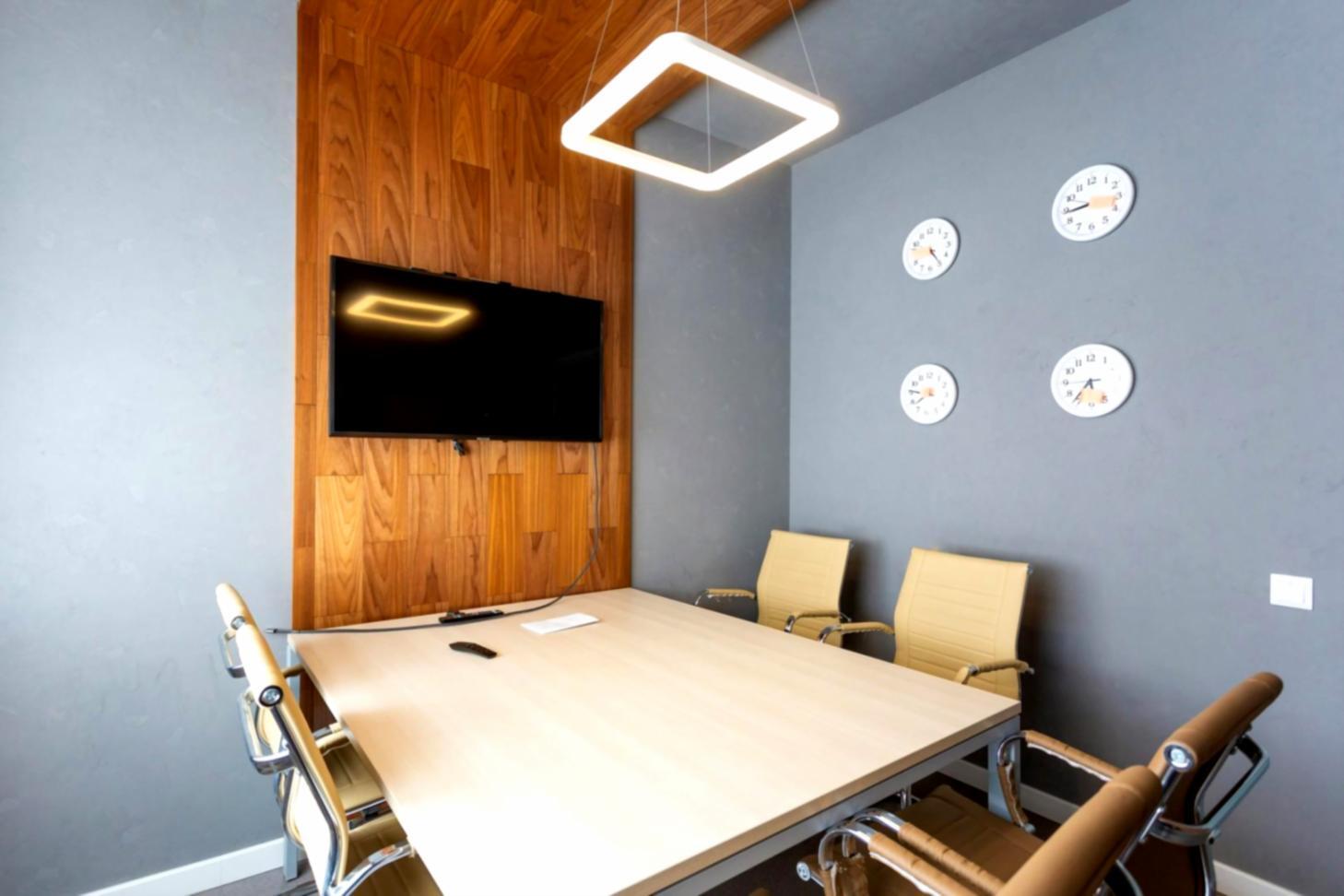 Founder presenting refined pitch deck to potential investors